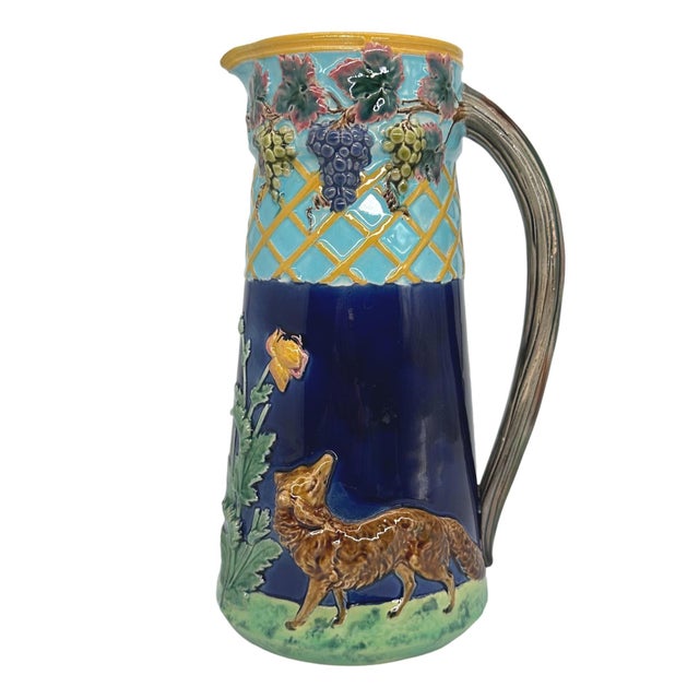 T.C. Brown-Westhead, Moore & Co. Majolica Jug Depicting 'The Fox and the Grapes from Aesop's Fables, with a molded and...