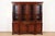 An outstanding Georgian or Chippendale style lighted breakfront bookcase cabinet or dining cabinet By Kindel Furniture...