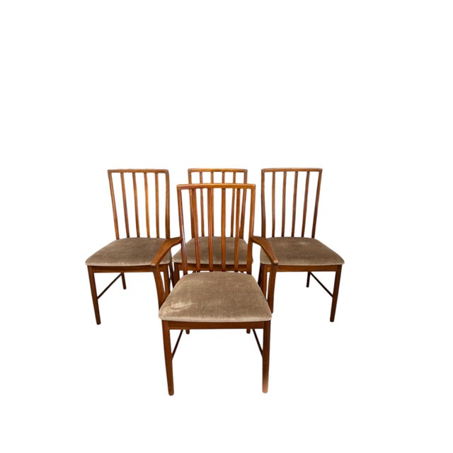 Beautiful set of four solid wood mid-century dining chairs attributed to AH McIntosh of Scotland circa early 1970's. These...