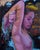 Lost in the Fire depicts a figure in a moment of introspection, with a striking interplay of vibrant colors and subtle...