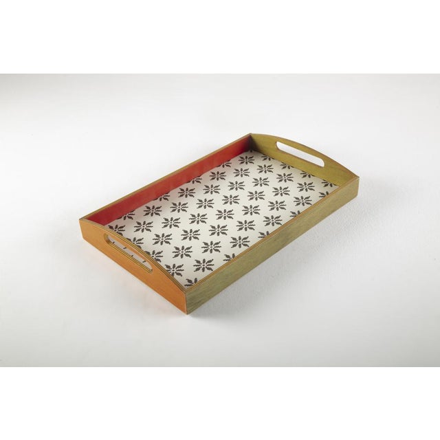 tray made of wood with printed decorations and colored anilines on the sides. Production memphis period 1995 dimensions l....