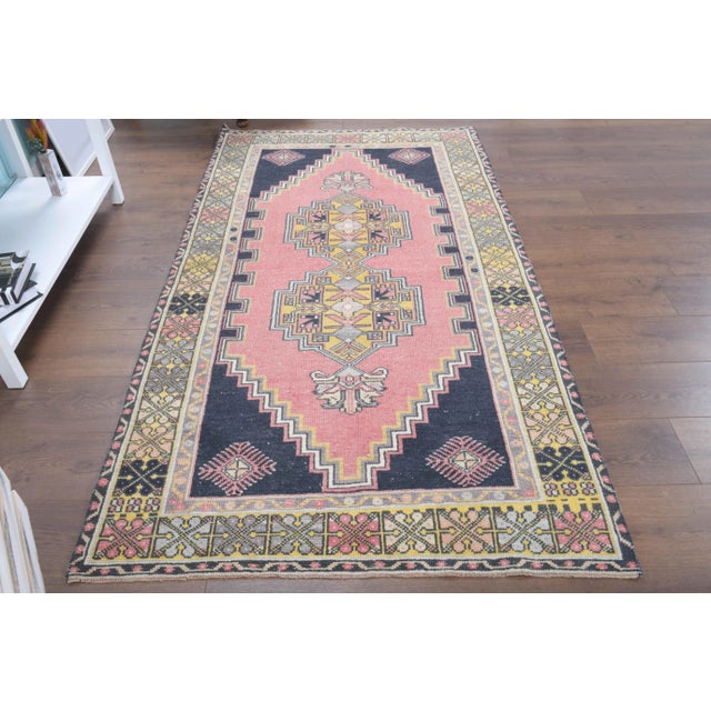 Vintage Turkish Hand-Knotted vintage rug is a semi-antique vintage area rug.'70s Eastern region of Turkey's unique rug is...