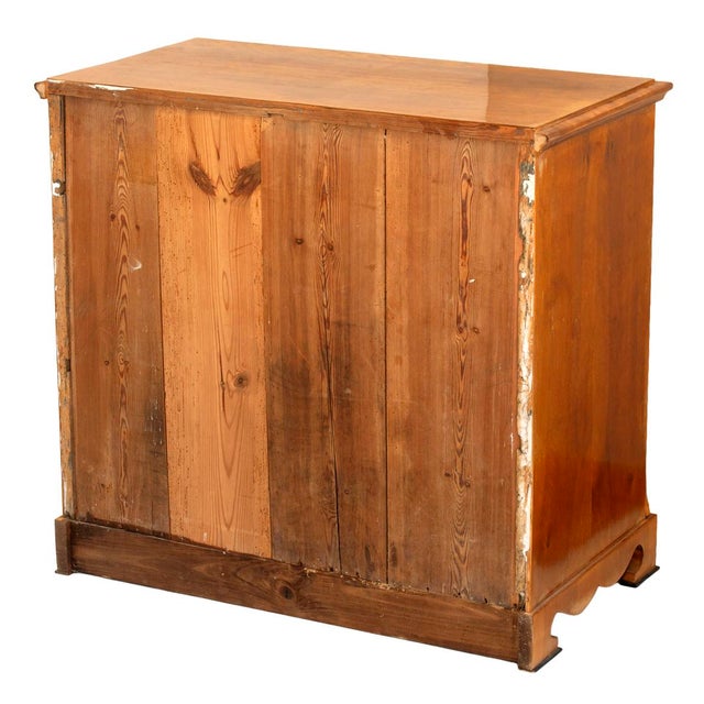 Antique German Biedermeier three drawer chest of drawers constructed with birch veneers during the first half of the 19th...