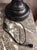 Designer lamp resembling a scientific tube, crafted from blown glass and mounted on an elegant blackened wood base. This...