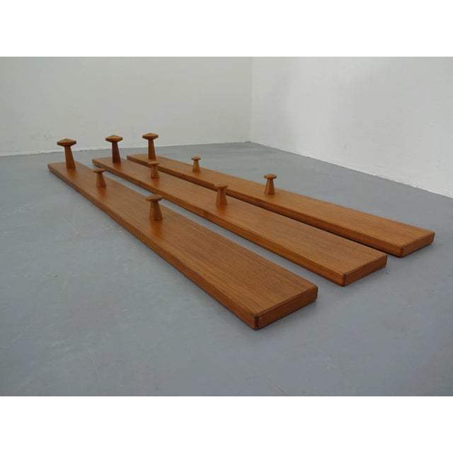 This 3-piece Danish wardrobe in solid teak was designed by Aksel Kjersgaard. This piece has an attribution mark, I am sure...