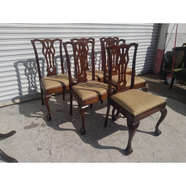 This ad is for a set of 6 Chippendale Ball and Claw style dining chairs. The chairs have a nice fabric. They date to the...