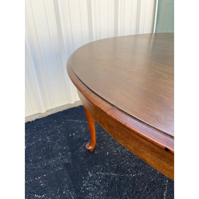 Early 1900s Large Round Oak Farmhouse Dining Table For Sale - Image 10 of 12