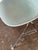 Add Mid-Century Modern utility to your space with this vintage Herman Miller Eames DSS-TA tablet arm chair. It features a...
