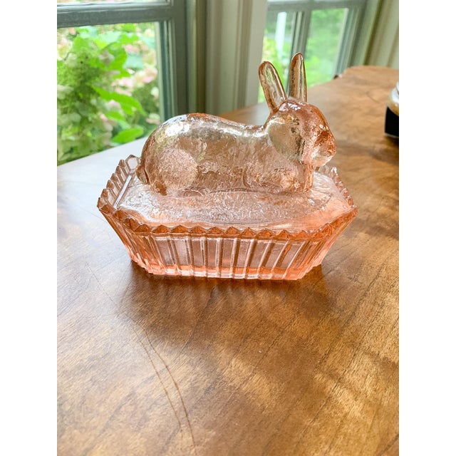 Vintage Pink Depression Glass Rabbit Covered Dish Bring a touch of vintage charm to your home with this delightful pink...
