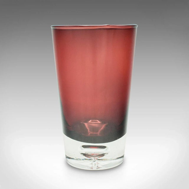 This is a vintage flower vase. A Finnish, coloured glass display pot, dating to the mid 20th century, circa 1960. A...