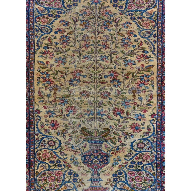 A fantastic early 20th century Persian Lavar Kirman prayer with a wonderful tree-of-life sprouting from a large vase all...