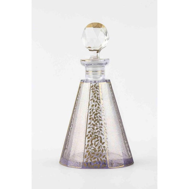 Vintage Art Deco crystal perfume bottle. Gilded decorations.Attributed to Moser, Austria. Includes its original cap. Very...