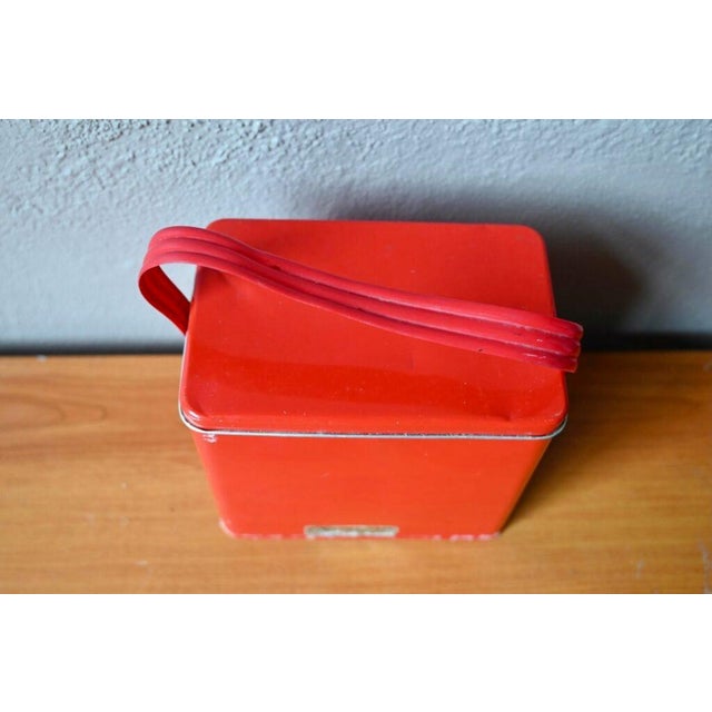 We discovered this curious aluminum suitcase in Denmark. It's a retro version of an everyday object that everyone there...