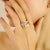 Bold yet refined, this contemporary bypass ring is masterfully crafted in 14k white gold and adorned with 1.07 carats of...