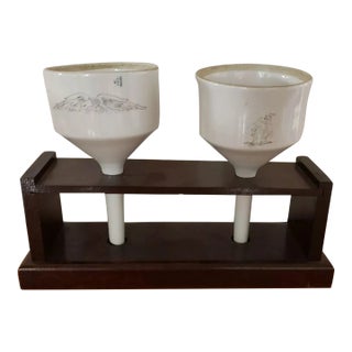 Pair of 1970s Coors Porcelain Scrimshaw Style Buchner Funnels in Wooden Stand For Sale