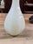 Design Plus Gallery presents the Baljade Beveled Vase from Baker. This sculptural vase has a milky white translucent body...