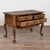 19th century French chest of drawers or console table crafted in oak. The piece features two drawers over one long drawer....