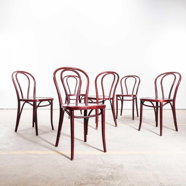 1980’s Classic Dark Mahogany Hoop Back Bentwood Dining Chair. Beautiful dark red mahogany coloured chairs, they are the...