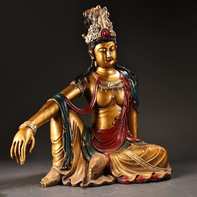 This is a finely crafted antique polychrome bronze sculpture of Guanyin Bodhisattva, the Bodhisattva of Compassion,...