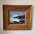 This 1938 oil painting on board by artist Arthur J. Hammond captures a moody seaside scene of waves crashing against...