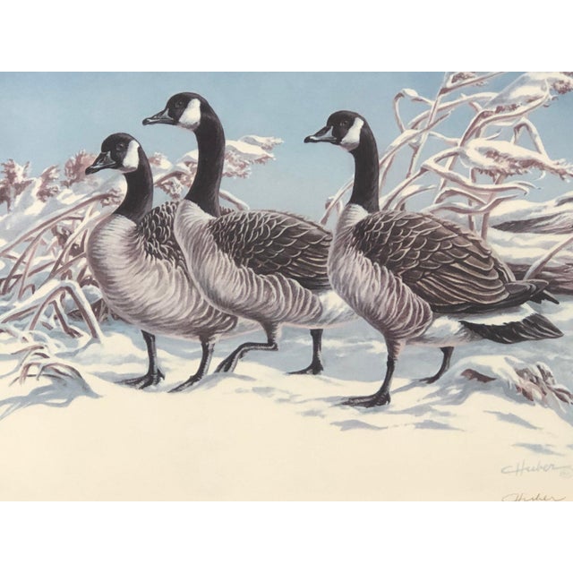 Vintage Lithograph of Three Geese Walking in the Snow, Brown Framed Charming vintage lithograph depicting three geese...