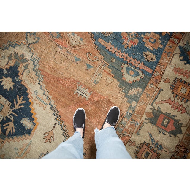 :: Nuanced and asymmetric center medallion with partial Samovar contour atop an abrashed field covered in simplistic...