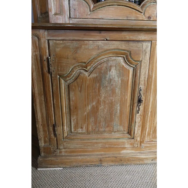 Large limed pine bookcase with three doors in the lower part and three mesh doors in the upper part. Period late 19th...