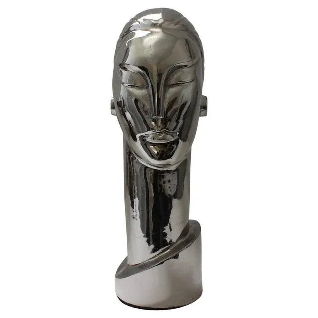 This stylish and chic Art Deco revival bust of a young woman is very much in the style of pieces created by Franz Hagenaur...