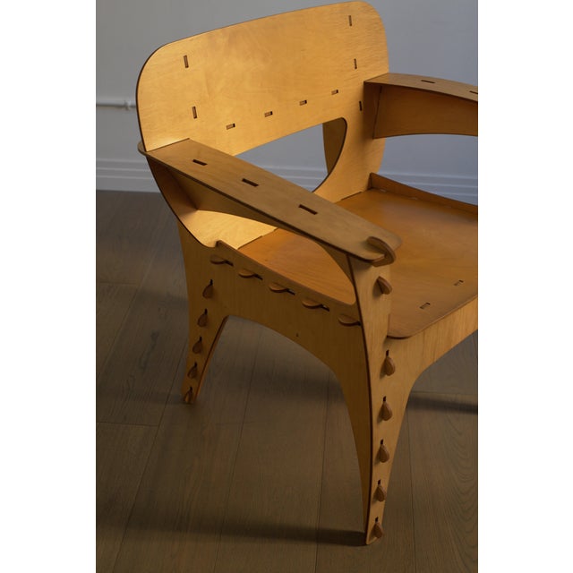 Original David Kawecki Puzzle Chair, a standout example of postmodern functional design. Crafted from interlocking wood...