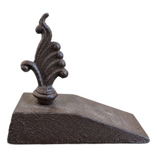 French Wrought Iron Doorstop With Ornate Foliate Finial For Sale