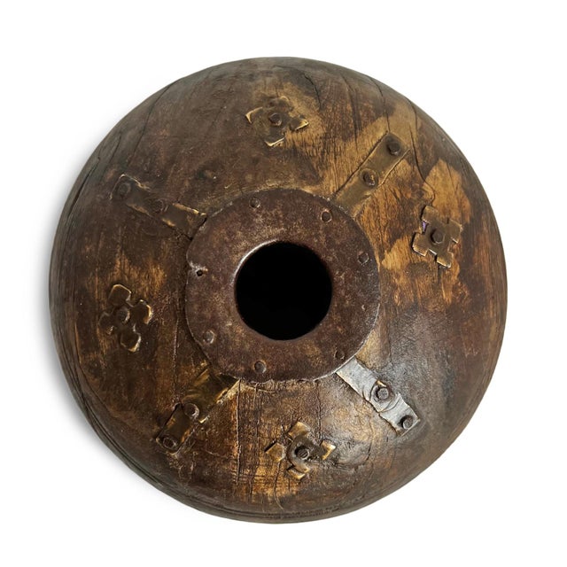 Antique old wooden tobacco container from India. Adorned with brass / metal decorative details. Each is unique and sold...