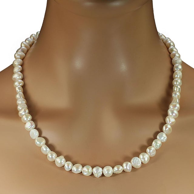 A 22‑inch iridescent double‑shine creamy white pearl necklace like this deserves a description that captures its quiet...