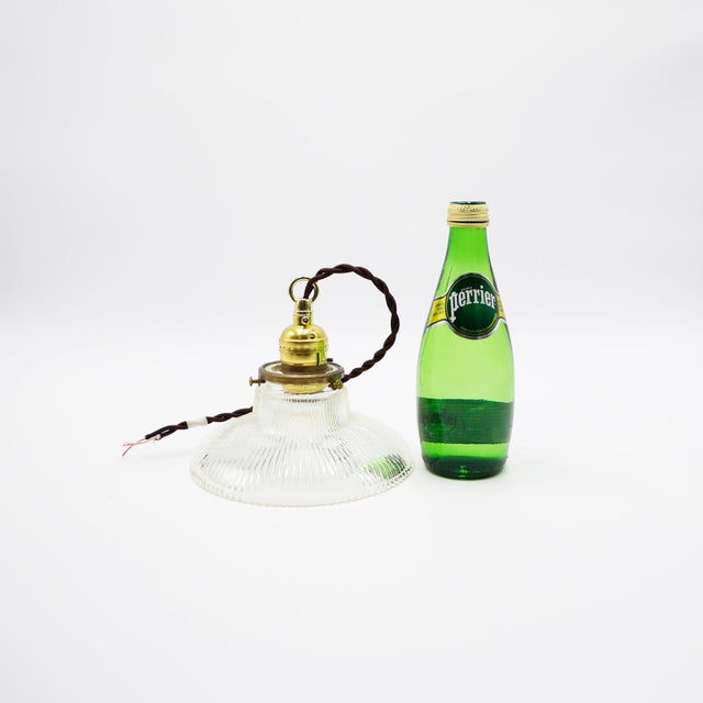 We offer this Holophane Clear Glass Vintage Industrial Pendant Light. Prismatic glass shades in excellent condition. The...