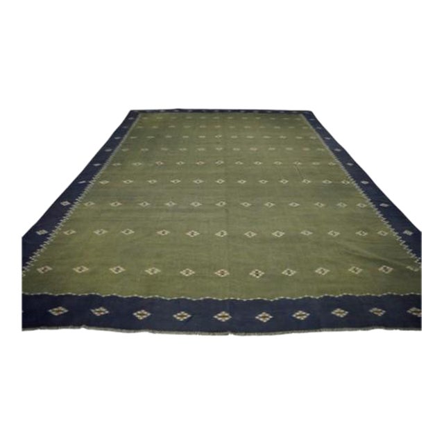 Oversized Vintage Dhurrie Solid Rug in Green With Blue Border | Rug & Kilim For Sale