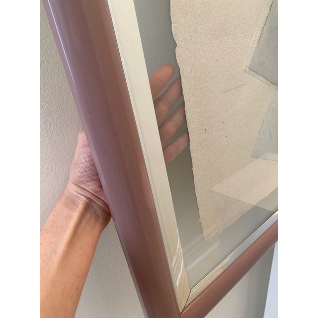 1987 Postmodern original organic paper art collage. Featuring unique floating acrylic matting with mauve metal frame....