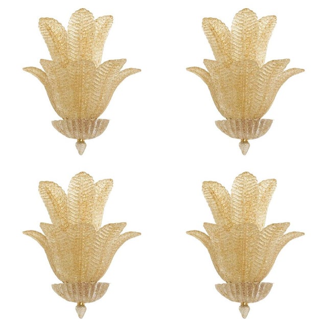Shenographic wall sconce in Mrano glass. Leaves in gold graniglia, metal frame in white A piece of hight italian hand-...