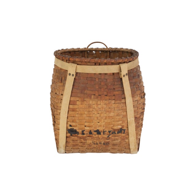 Early 20th C. adirondack trapper basket with canvas strap detail. No maker's mark. Minimal age wear.