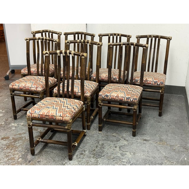 Design Plus Gallery presents a Set of Eight Bamboo Dining Side Chairs from McGuire Furniture. The dining chairs are...