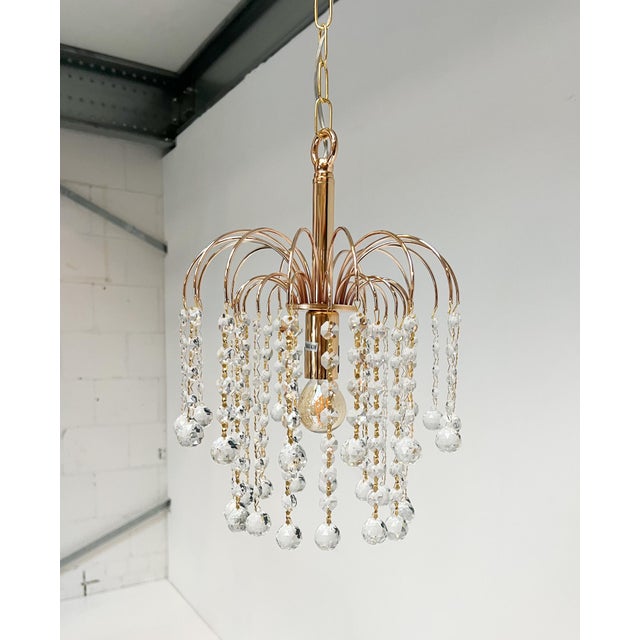 Completely in Regency style! Chandelier from Louis LX consisting of a 24 carat gold leaf frame and Swarowski Strass...