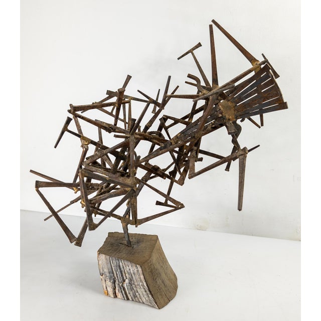 We are selling this interesting Mid-Century Modern nail sculpture. This brutalist sculpture is better than most nail...