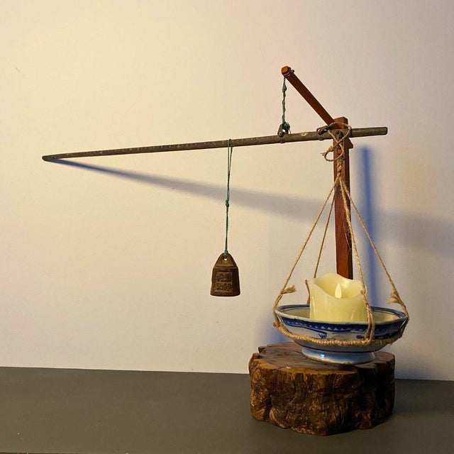 This philosophical sculptural lamp transforms a utilitarian object into an instrument of contemplation. A 1987 Chinese...