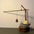 This philosophical sculptural lamp transforms a utilitarian object into an instrument of contemplation. A 1987 Chinese...