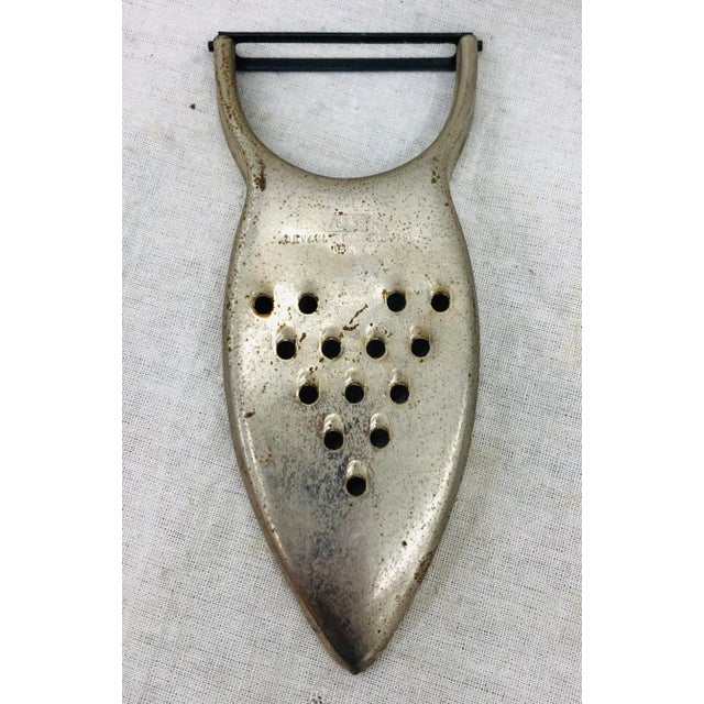 Fantastic Vintage Silver Metal Bar / Kitchen Tool, Made by S & S (USA). Features peeler and grater ability, comfortable in...