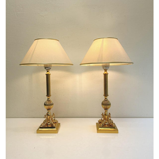 A wonderful and rare set of table lamps from the 1960s. This lamps are made of gold shiny brass, beautifully designed and...