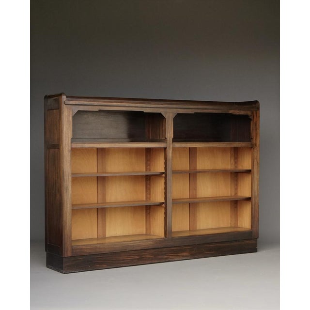 A good quality Dutch art deco walnut andstained beech wood bookcase in 1930s Amsterdam School style.