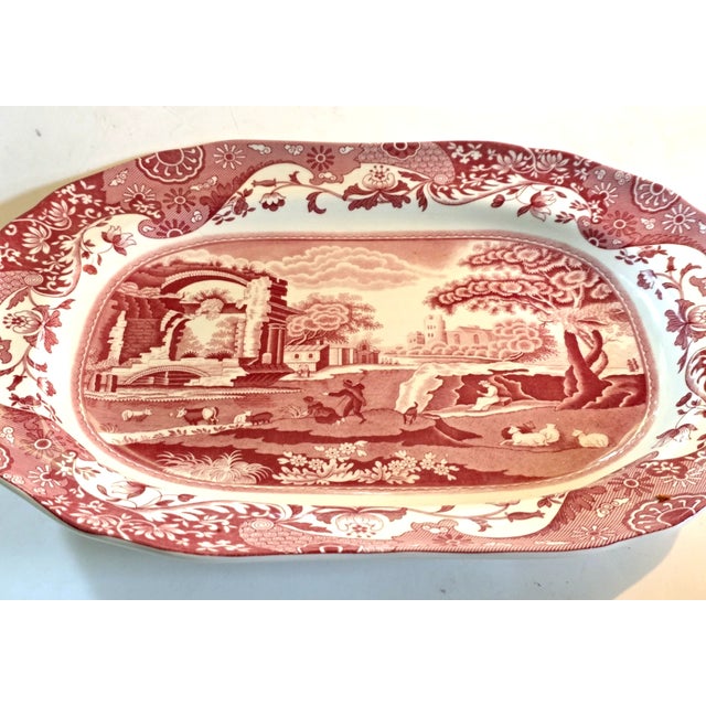 Enhance your table with the timeless beauty of this vintage Spode *Italian Red* (Cranberry) serving platter. Featuring the...