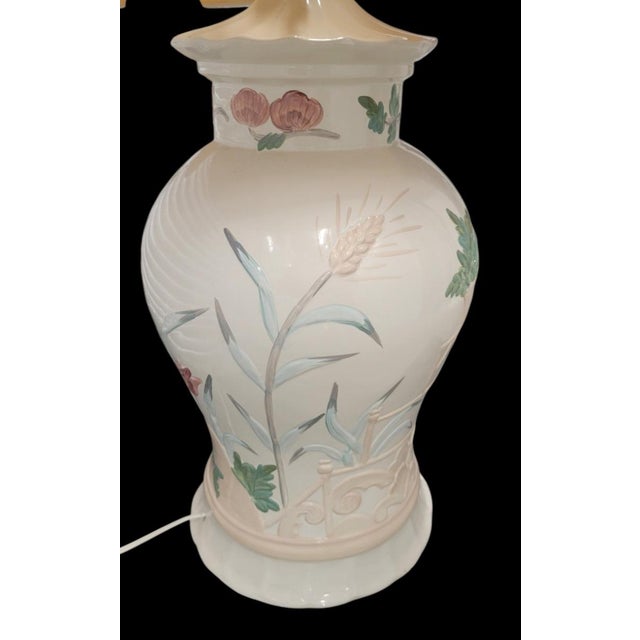 Bring timeless chinoiserie elegance to your space with this stunning pair of vintage ceramic table lamps. Designed in a...