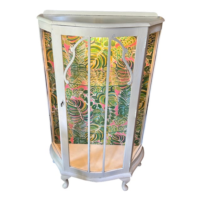 Vintage White Wooden Short Light Up Glass Display Cabinet With Tropical Wallpaper Background For Sale