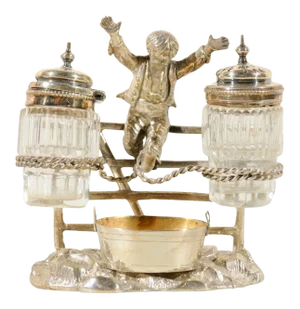 Circa 1873 English Silverplate Cruet Set of Young Boy Leaping in the Air