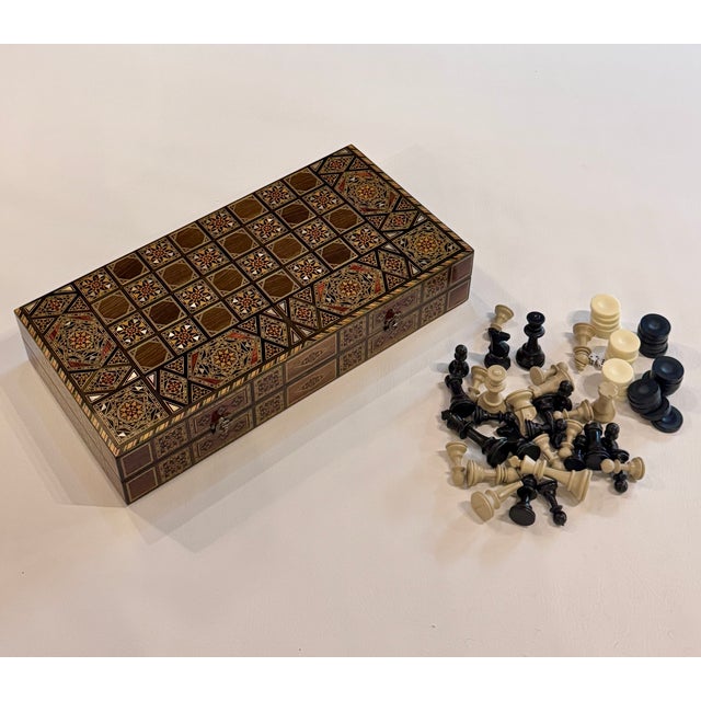 Exceptional handcrafted backgammon and chess set from Damascus, expertly inlaid with natural mother of pearl. Created...